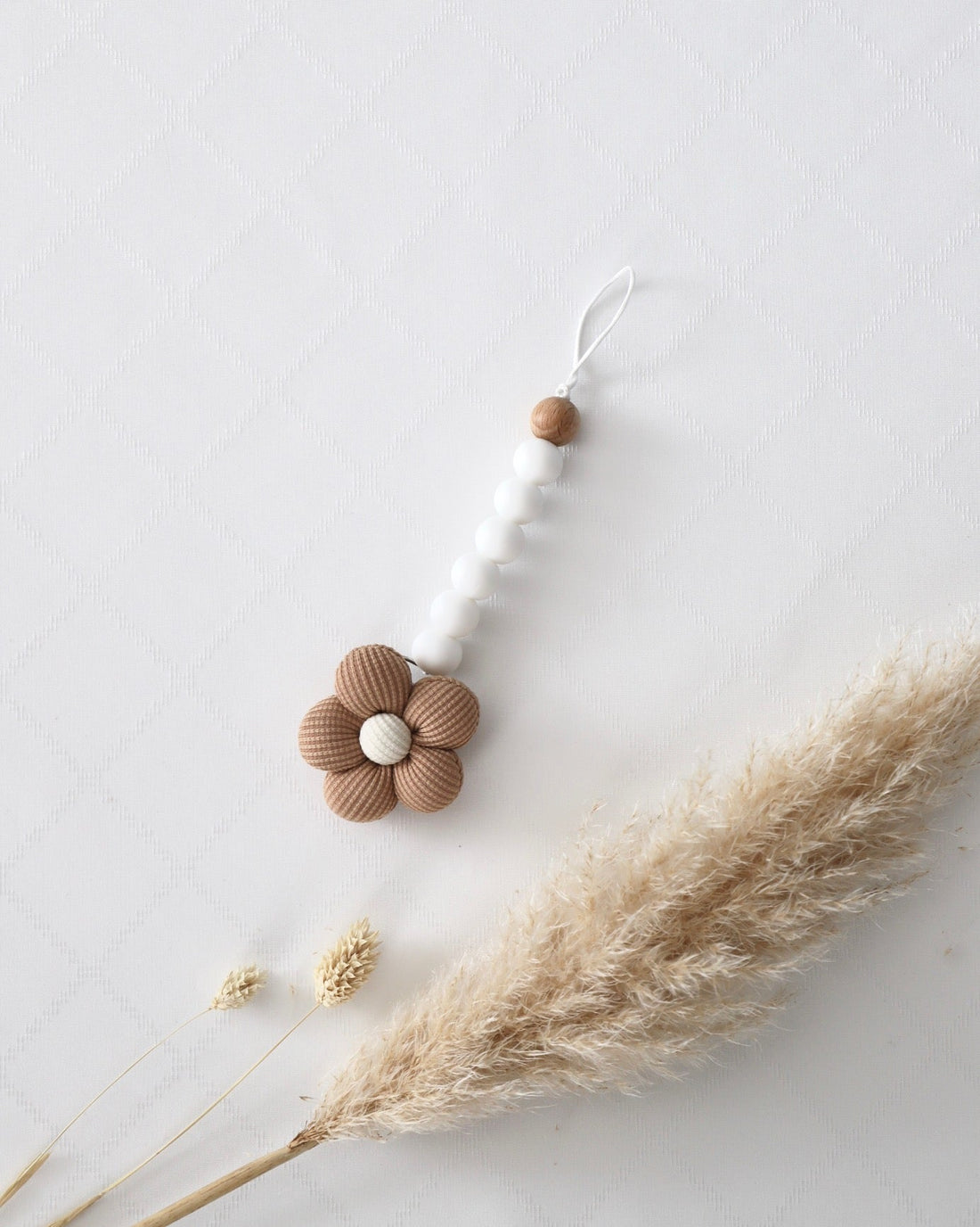 Schnullerkette Blume braun - OYKAMI in a box