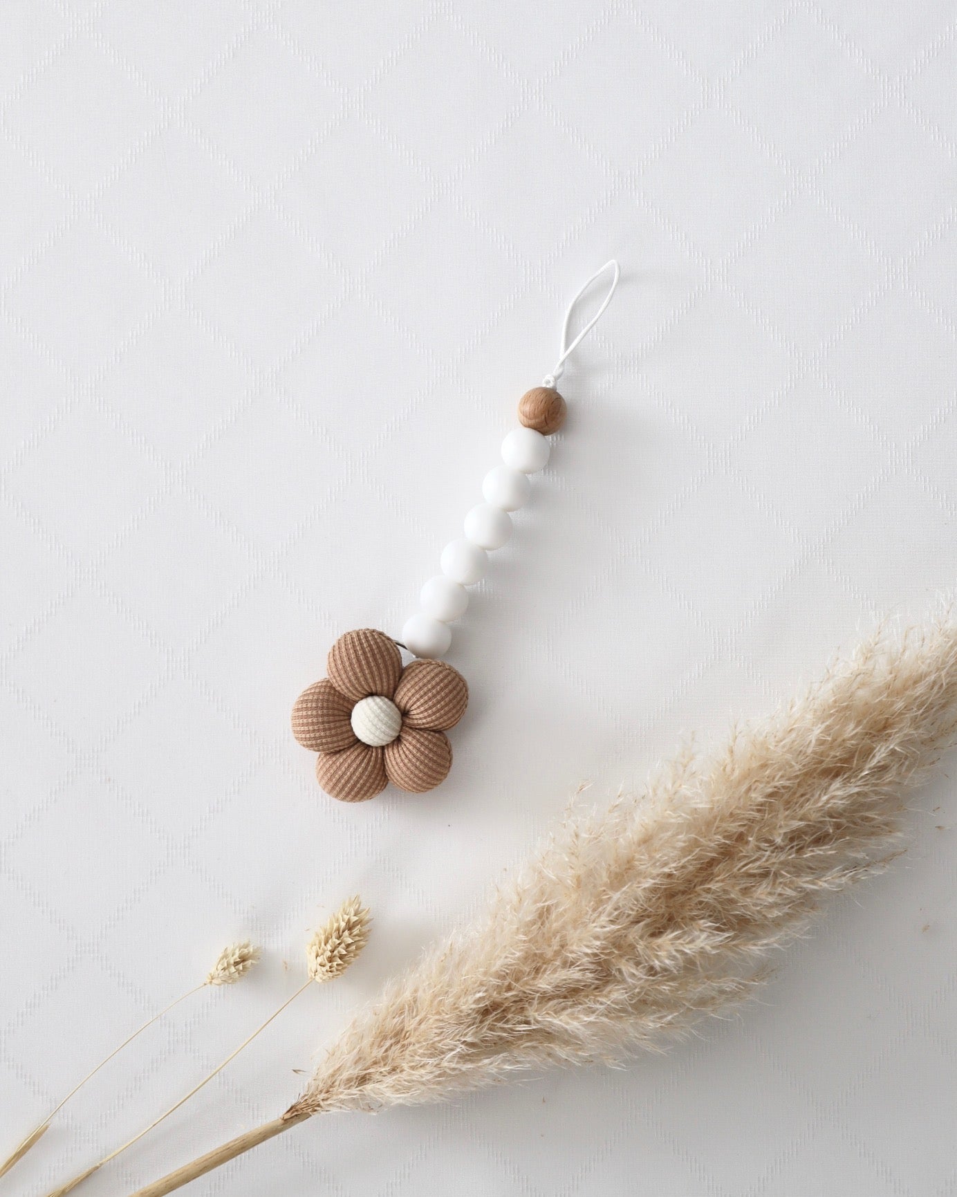 Schnullerkette Blume braun - OYKAMI in a box